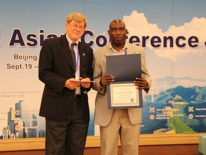 4th Asian IAAE Conference IAEE Best students paper award 2014 , Beijing china. Left Peter Hartley (IAEE president).